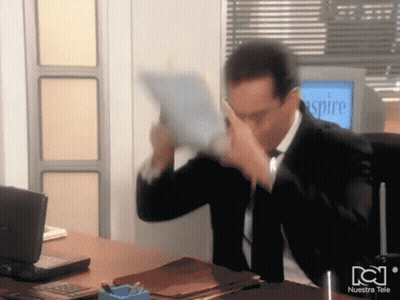 Man In Suit And Tie Sitting At Desk In Front Of Aspire Monitor GIF