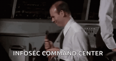 Man In Suit And Tie Sitting At Desk Talking Into Microphone GIF