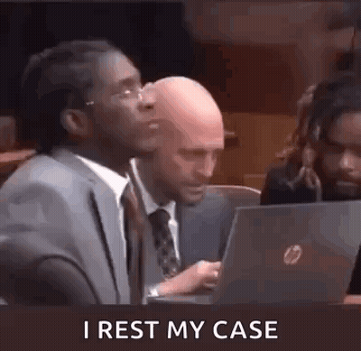 Man In Suit And Tie Sitting At Laptop GIF