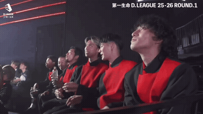 Man In Suit And Tie Sitting In Room GIF