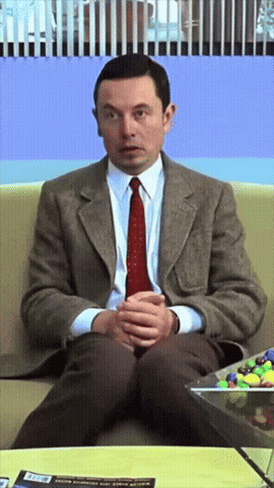 Man in Suit and Tie Sitting on Couch