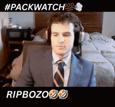Man In Suit And Tie Sitting #Packwatch 100 GIF