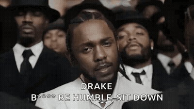 Man In Suit And Tie Sitting GIF