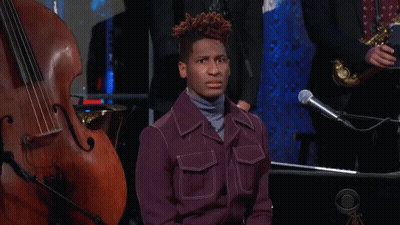 Man In Suit And Tie Smiling GIF
