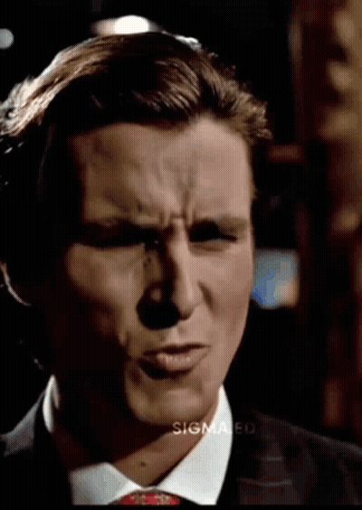 Man In Suit And Tie Smiling GIF