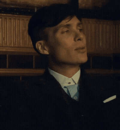 Man In Suit And Tie Smiling GIF
