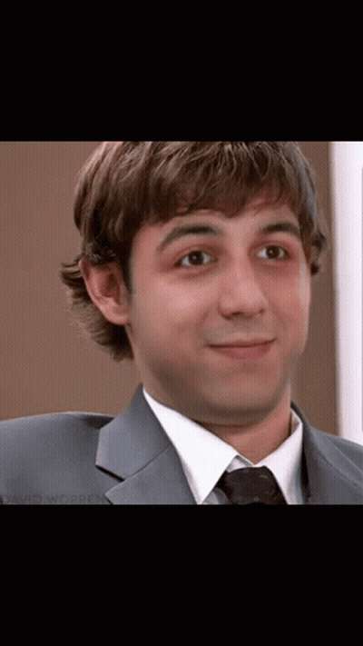 Man In Suit And Tie Smiling GIF