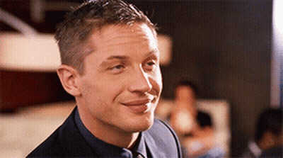 Man In Suit And Tie Smiling At Camera GIF