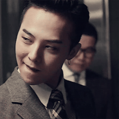 Man In Suit And Tie Smiling At Camera GIF