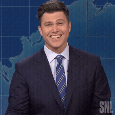Man In Suit And Tie Smiling At SNL GIF