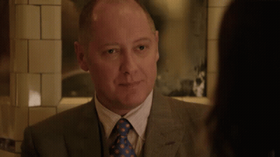 Man In Suit And Tie Smiling At Woman GIF
