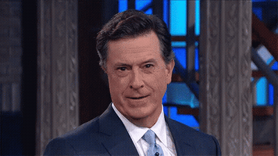 Man In Suit And Tie Smiling Blue Background GIF