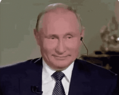 Man In Suit And Tie Smiling GIF