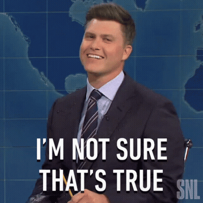 Man In Suit And Tie Smiling I'm Not Sure That's True GIF