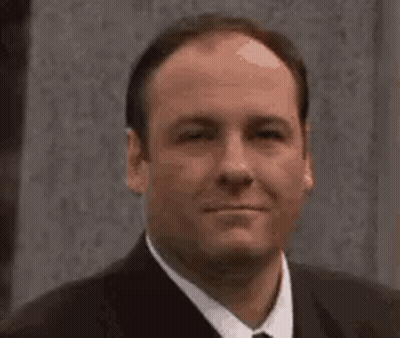 Man In Suit And Tie Smiling GIF