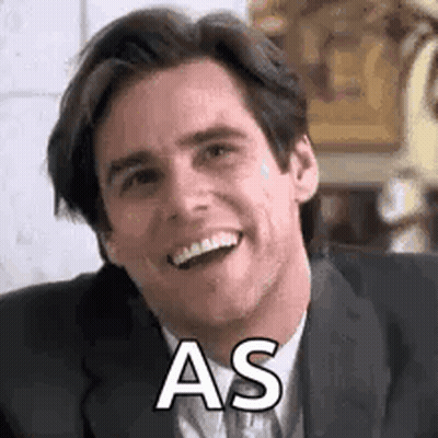 Man In Suit And Tie Smiling Making Face GIF