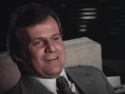Man In Suit And Tie Smiling GIF