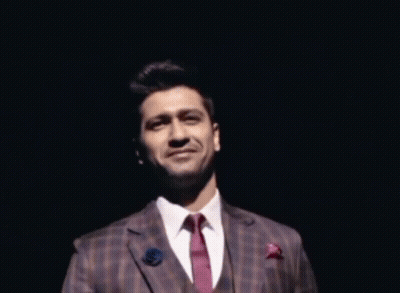 Man In Suit And Tie Smiling GIF