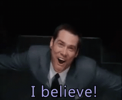Man In Suit And Tie Smiling Saying I Believe GIF
