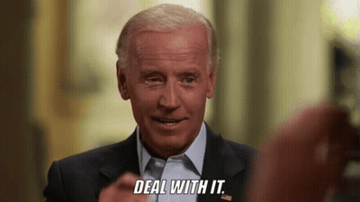 Man In Suit And Tie Smiling Says Deal With It GIF
