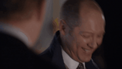Man In Suit And Tie Smiling With Eyes Closed GIF