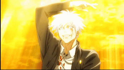 Man In Suit And Tie Smiling With Hand Up GIF