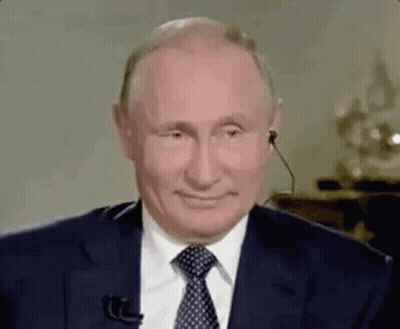 Man In Suit And Tie Smiling GIF
