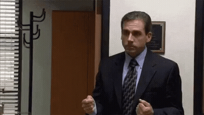 Man In Suit And Tie Standing GIF