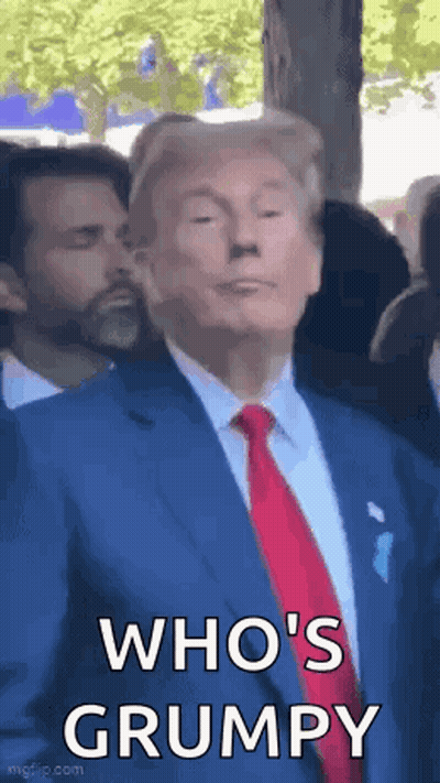 Man In Suit And Tie Standing GIF