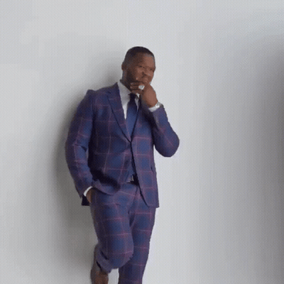 Man In Suit And Tie Standing GIF