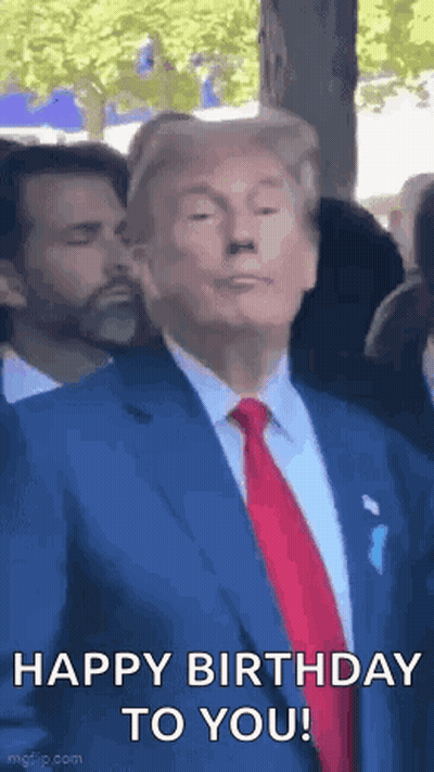Man In Suit And Tie Standing Before Crowd GIF
