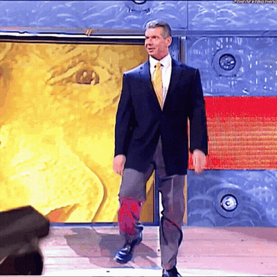 Man In Suit And Tie Standing In Front Of Wall Saying The Next Thing GIF