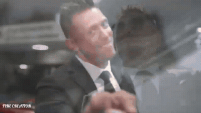 Man In Suit And Tie Standing GIF