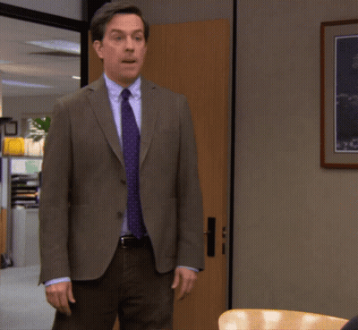 Man In Suit And Tie Standing GIF