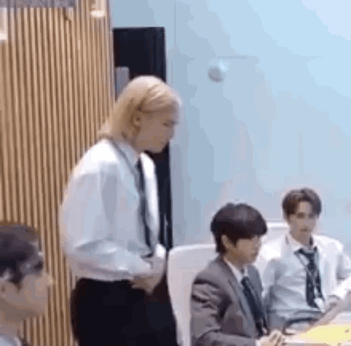 Man In Suit And Tie Standing GIF