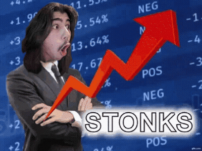 Man In Suit And Tie Stands Before Stonks Graph GIF