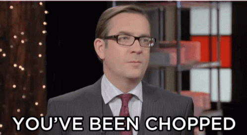 Man In Suit And Tie Talking About Being Chopped GIF