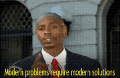 Man In Suit And Tie Talking About Modern Problems GIF