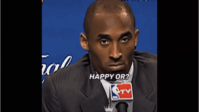 Man In Suit And Tie Talking Into NBA TV Microphone GIF