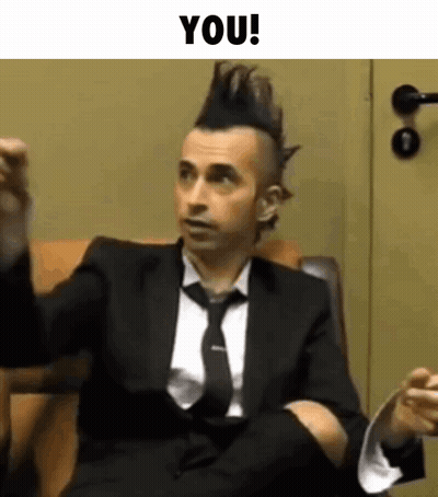 Man In Suit And Tie Talking GIF