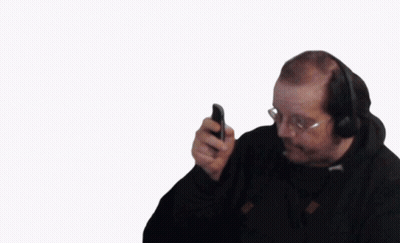 Man In Suit And Tie Talking On Cell Phone GIF
