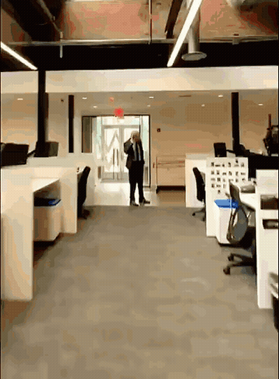 Man In Suit And Tie Talking On Cell Phone GIF