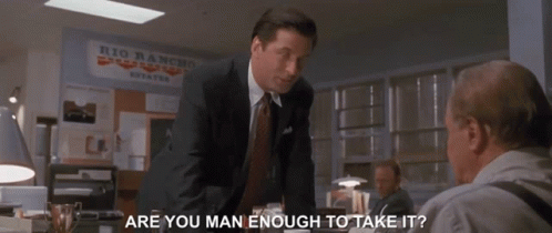 Man In Suit And Tie Talking To Another Man In Front Of Rio Rancho Sign GIF