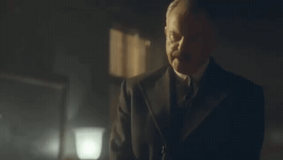 Man In Suit And Tie Talking To Churchill GIF
