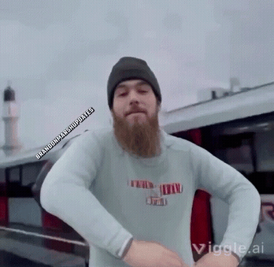 Man In Suit And Tie Talking To TV GIF