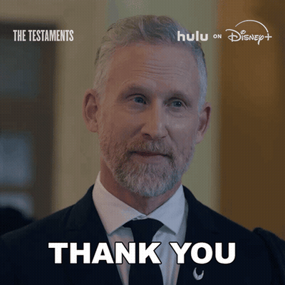 Man In Suit And Tie Thanking GIF