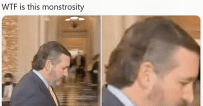 Man In Suit And Tie Walking Down Hallway GIF