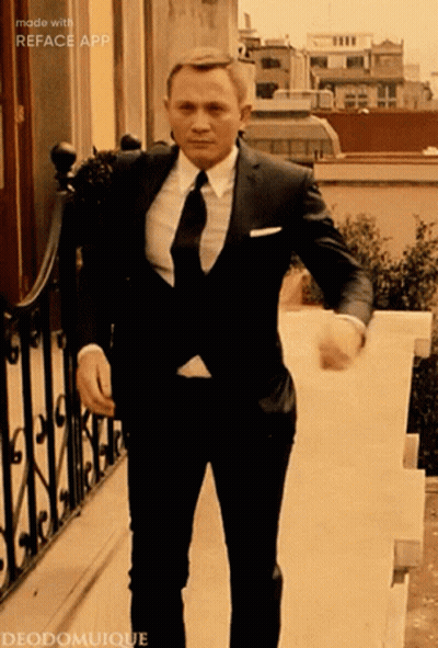 Man In Suit And Tie Walking Down Stairs GIF