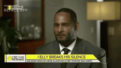 Man In Suit And Tie Watching CBS News GIF