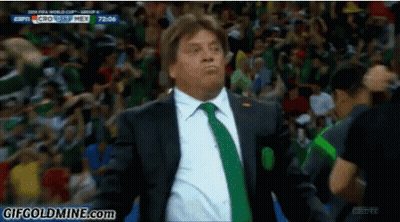 Man In Suit And Tie Watching Soccer Game Sponsored By ESPN GIF
